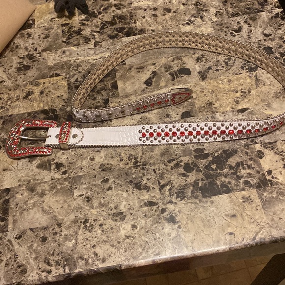 White and red bezel belt light wear and tear good shape. - Picture 3 of 3